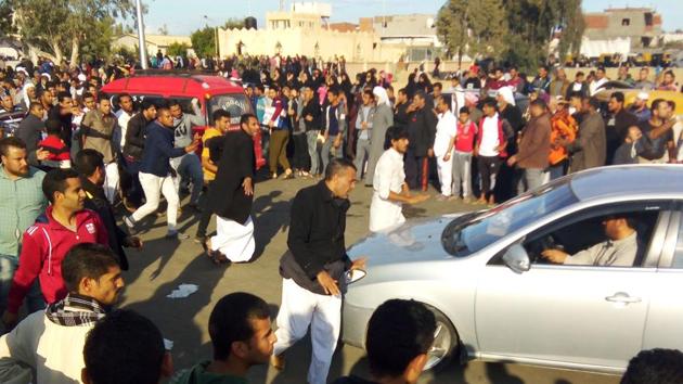 Egyptians gather at the site of a gun and bombing attack that targeted the Rawda mosque near North Sinai provincial capital of El-Arish on November 24, 2017. Armed attackers killed at least 235 worshippers. (AFP) Egyptians gather at the site of a gun and bombing attack that targeted the Rawda mosque near North Sinai provincial capital of El-Arish on November 24, 2017. Armed attackers killed at least 235 worshippers. (AFP)
