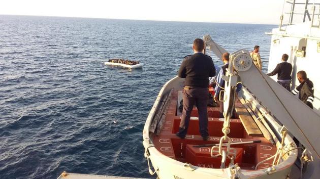 Migrants arrive at a naval base after they were rescued by the Libyan coastal guard in Tripoli on November 23. (REUTERS) Migrants arrive at a naval base after they were rescued by the Libyan coastal guard in Tripoli on November 23. (REUTERS)