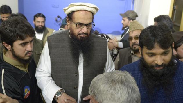 Pakistani head of the Jamaat-ud-Dawa (JuD) organisation Hafiz Saeed (2L) meets with supporters after offering Friday prayers at Jamia AL Qadsia Masjid following his released in Lahore on November 24, 2017. (AFP) Pakistani head of the Jamaat-ud-Dawa (JuD) organisation Hafiz Saeed (2L) meets with supporters after offering Friday prayers at Jamia AL Qadsia Masjid following his released in Lahore on November 24, 2017. (AFP)