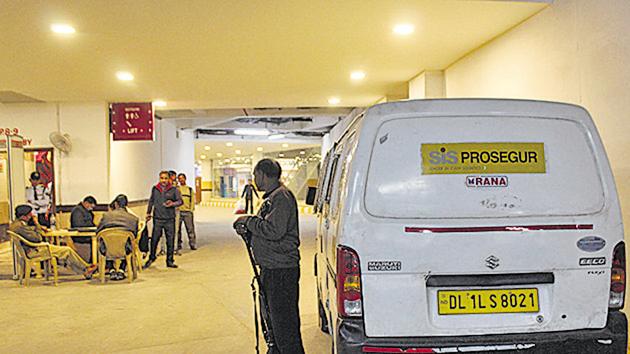 The incident took place when the van — carrying a security guard, a driver and two staff — was parked at the Ambience Mall basement to refill money in a Citi Bank machine. The incident took place when the van — carrying a security guard, a driver and two staff — was parked at the Ambience Mall basement to refill money in a Citi Bank machine.