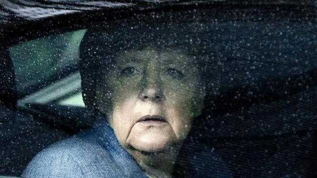 German Chancellor Angela Merkel looks through raindrops on her car window as she arrives for a summit at the European Council in Brussels on November 24, 2017. Leaders from the EU and six former Soviet states meet in Brussels on November 24 for the latest summit aimed at deepening ties. (Virginia Mayo / AFP) German Chancellor Angela Merkel looks through raindrops on her car window as she arrives for a summit at the European Council in Brussels on November 24, 2017. Leaders from the EU and six former Soviet states meet in Brussels on November 24 for the latest summit aimed at deepening ties. (Virginia Mayo / AFP)