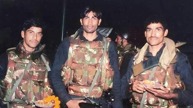 Keshav Singh Gurjar (centre), a former commando of the National Security Guard (NSG), who has taken VRS (voluntary retirement scheme) from the army. (HT Photo) Keshav Singh Gurjar (centre), a former commando of the National Security Guard (NSG), who has taken VRS (voluntary retirement scheme) from the army. (HT Photo)