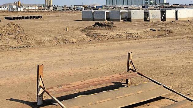 Construction work for basic infrastructure proceeds in the activation zone in far-flung Dholera village, Gujarat. (HT Photo) Construction work for basic infrastructure proceeds in the activation zone in far-flung Dholera village, Gujarat. (HT Photo)