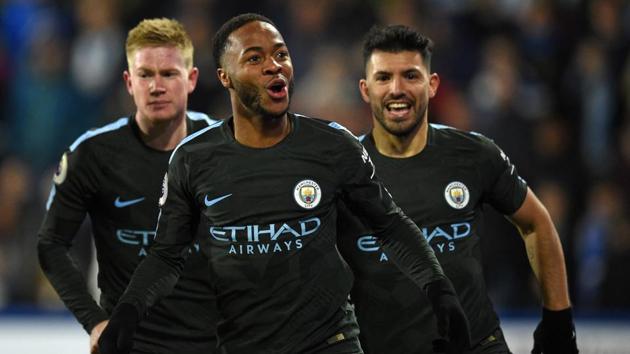 Manchester City's Raheem Sterling celebrates after scoring against Huddersfield Town in a Premier League match.(AFP)