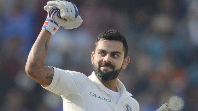 Virat Kohli celebrates after scoring his double century on Day 3 of the second India vs Sri Lanka Test in Nagpur. Get highlights of India vs Sri Lanka, 2nd Test Day 3, Nagpur, here(PTI)