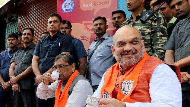 BJP chief Amit Shah listening to Prime Minster Narendra Modi's Mann Ki Baat radio programme in Ahmedabad on Sunday. (PTI) BJP chief Amit Shah listening to Prime Minster Narendra Modi's Mann Ki Baat radio programme in Ahmedabad on Sunday. (PTI)