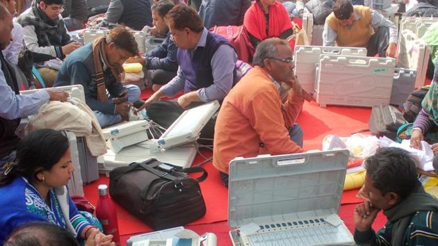 Polling officers collect electronic voting machines before leaving for polling booth in Lucknow on Saturday. (PTI Photo) Polling officers collect electronic voting machines before leaving for polling booth in Lucknow on Saturday. (PTI Photo)