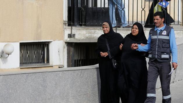 Relatives of victims of the Al Rawdah mosque attack, are seen leaving the Suez Canal University hospital in Ismailia, Egypt November 25, 2017. (REUTERS Photo) Relatives of victims of the Al Rawdah mosque attack, are seen leaving the Suez Canal University hospital in Ismailia, Egypt November 25, 2017. (REUTERS Photo)