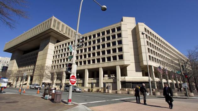This Feb. 3, 2012, file photo shows FBI headquarters in Washington. Many U.S. diplomatic, military and government figures were not told about Russia-linked attempts to hack into their emails, even though the FBI knew they were in the Kremlin’s crosshairs, The Associated Press has learned. (AP) This Feb. 3, 2012, file photo shows FBI headquarters in Washington. Many U.S. diplomatic, military and government figures were not told about Russia-linked attempts to hack into their emails, even though the FBI knew they were in the Kremlin’s crosshairs, The Associated Press has learned. (AP)