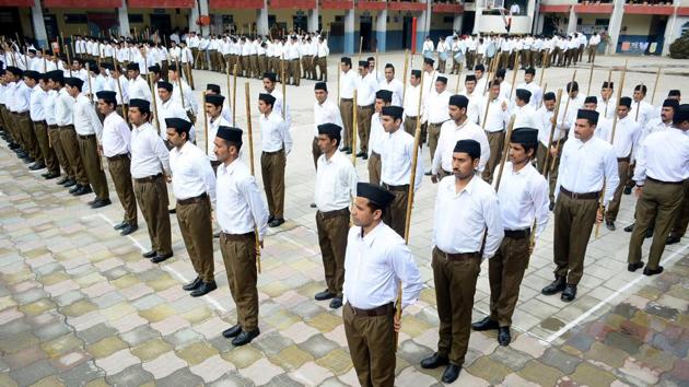 RSS workers, apart from eulogising merits of a ‘united Hindu electorate’ are also leveraging the appeal of PM Modi.(HT File Photo)