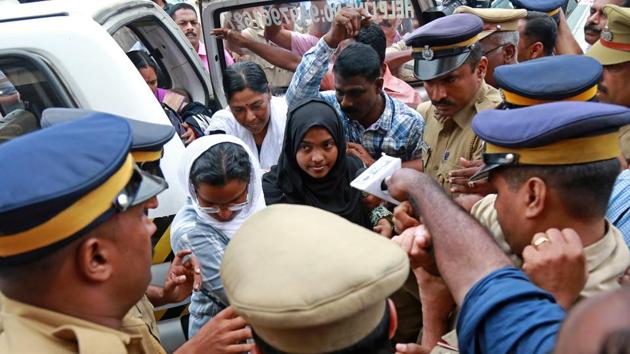 Akhila, 24, who converted to Islam in 2016 and took a new name, Hadiya, at the airport in Kochi on Saturday before she left for New Delhi to appear before the top court on Monday.(REUTERS photo) Akhila, 24, who converted to Islam in 2016 and took a new name, Hadiya, at the airport in Kochi on Saturday before she left for New Delhi to appear before the top court on Monday.(REUTERS photo)