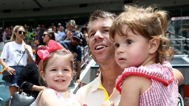 David Warner of Australia celebrates with his daughters Ivy and Indi as the team celebrated with their family members. (Getty Images)