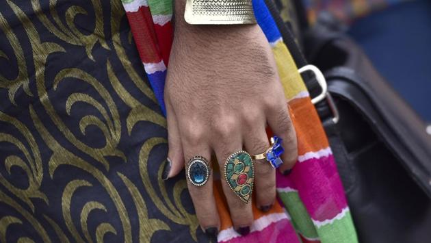 A participant flaunts finger rings during the Namma Pride and Karnataka Queer Habba celebrations in Bengaluru. Over the past decade, homosexuality has gained a degree of acceptance in India, especially in metro cities but the community continues to struggle for wider legal and societal acceptance. (Arijit Sen / HT Photo) A participant flaunts finger rings during the Namma Pride and Karnataka Queer Habba celebrations in Bengaluru. Over the past decade, homosexuality has gained a degree of acceptance in India, especially in metro cities but the community continues to struggle for wider legal and societal acceptance. (Arijit Sen / HT Photo)
