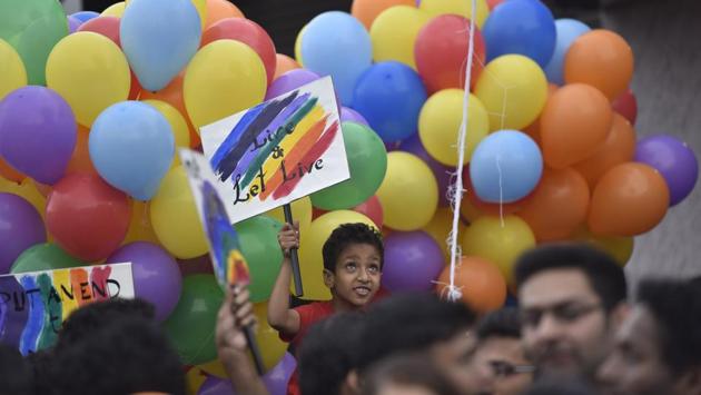 A child raises a placard in support of the LGBTQI community during the pride march in Bengaluru. This year, following a Supreme Court judgment guaranteeing the Right to Privacy as a fundamental right with sexual orientation being an essential attribute, members of the community hailed the verdict and said it would boost their fight against the previous judgment. (Arijit Sen / HT Photo) A child raises a placard in support of the LGBTQI community during the pride march in Bengaluru. This year, following a Supreme Court judgment guaranteeing the Right to Privacy as a fundamental right with sexual orientation being an essential attribute, members of the community hailed the verdict and said it would boost their fight against the previous judgment. (Arijit Sen / HT Photo)