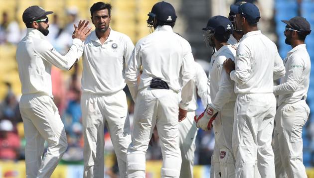 Ravichandran Ashwin (C) celebrates after India defeated Sri Lanka in the second Test match in Nagpur.(AFP)