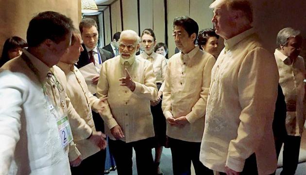 Prime Minister Narendra Modi with US President Donald Trump, Japanese Prime Minister Shinzo Abe and other world leaders at an ASEAN Summit dinner in Manila (PTI) Prime Minister Narendra Modi with US President Donald Trump, Japanese Prime Minister Shinzo Abe and other world leaders at an ASEAN Summit dinner in Manila (PTI)