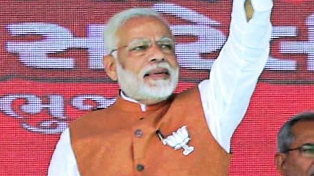 Prime minister Narendra Modi waves at the crowd during a public meeting in support of BJP candidates for assembly polls, in Bhuj on Monday. (PTI Photo) Prime minister Narendra Modi waves at the crowd during a public meeting in support of BJP candidates for assembly polls, in Bhuj on Monday. (PTI Photo)
