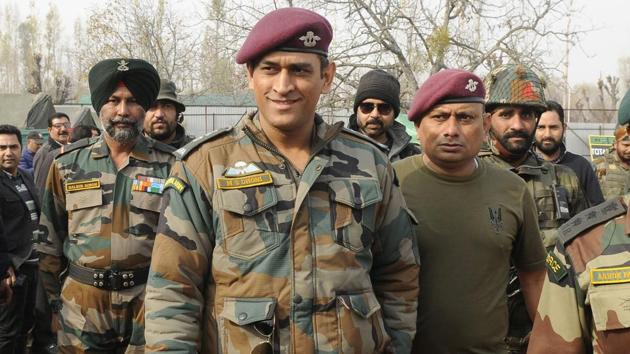 MS Dhoni visits a cricket match in Kunzer, 35 kms from Srinagar, during an Indian Army initiative. The former Indian captain feels the resumption of India vs Pakistan bilateral cricket is best left to the government.(HT Photo/Waseem Andrabi)