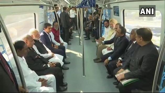 PM Narendra Modi, Telangana CM KC Rao and governor ESL Narasimhan take a ride in the newly inaugurated Hyderabad Metro. (ANI Photo) PM Narendra Modi, Telangana CM KC Rao and governor ESL Narasimhan take a ride in the newly inaugurated Hyderabad Metro. (ANI Photo)