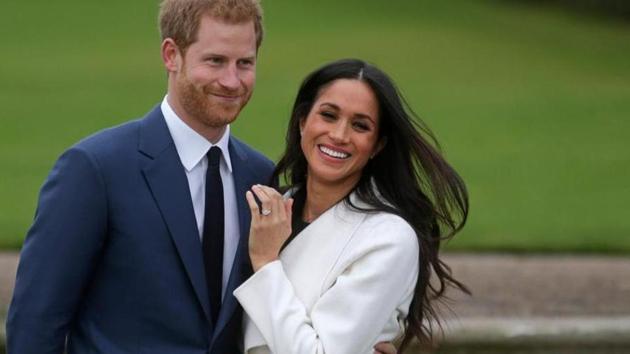 Britain’s Prince Harry with his fiancée US actress Meghan Markle in the Sunken Garden at Kensington Palace in London on Monday. (AFP) Britain’s Prince Harry with his fiancée US actress Meghan Markle in the Sunken Garden at Kensington Palace in London on Monday. (AFP)