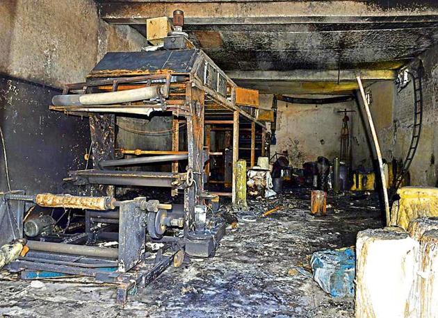 The gutted machinery after a fire broke out in a building housing a printing factory at Kirpal Nagar in Ludhiana on Sunday night. (Gurpreet Singh/HT) The gutted machinery after a fire broke out in a building housing a printing factory at Kirpal Nagar in Ludhiana on Sunday night. (Gurpreet Singh/HT)