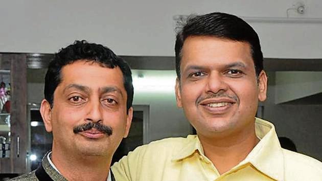 Prasenjit Fadnavis (left) has won a seat in the SPPU elections. He is seen here with Maharashtra CM Devendra Fadnavis. (HT Photo) Prasenjit Fadnavis (left) has won a seat in the SPPU elections. He is seen here with Maharashtra CM Devendra Fadnavis. (HT Photo)