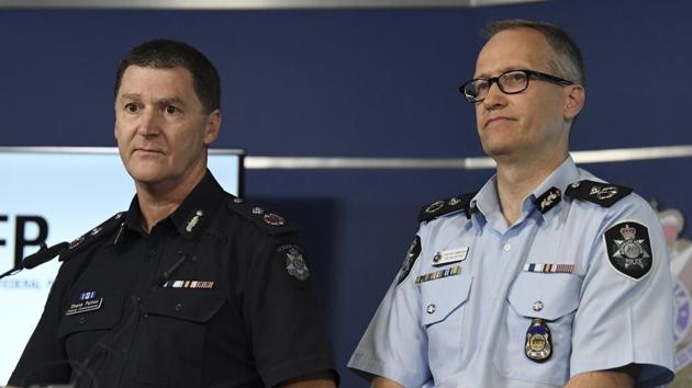 Australian Federal Police, acting deputy commissioner Ian McCartney, right, and Victoria State Police deputy commissioner Shane Patton address the media at the Victorian Police Centre in Melbourne Tuesday. (AP Photo) Australian Federal Police, acting deputy commissioner Ian McCartney, right, and Victoria State Police deputy commissioner Shane Patton address the media at the Victorian Police Centre in Melbourne Tuesday. (AP Photo)