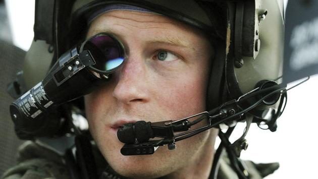 Britain’s Prince Harry or just Captain Wales as he is known in the British Army, wears a monocle gun sight as he sits in his cockpit at the British controlled flight-line in Camp Bastion, Afghanistan on December 12, 2012. He left the army in 2015 to focus on royal duties and charity work, particularly the welfare of military veterans, and continuing his mother’s work helping those with AIDS, and mental health issues. (AP)