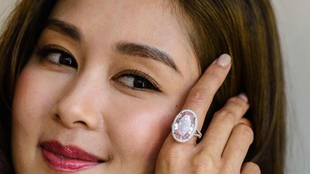 The 14.93-carat pink gemstone named the “Pink Promise” was sold on Tuesday for an eye-watering $32.16 million at auction in Hong Kong.(AFP file)