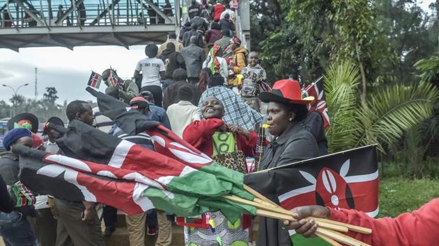 Hawkers and member of the public gather outside the Kasarani Stadium on November 28 to attend the inauguration ceremony of Kenyan President. (AFP Photo) Hawkers and member of the public gather outside the Kasarani Stadium on November 28 to attend the inauguration ceremony of Kenyan President. (AFP Photo)