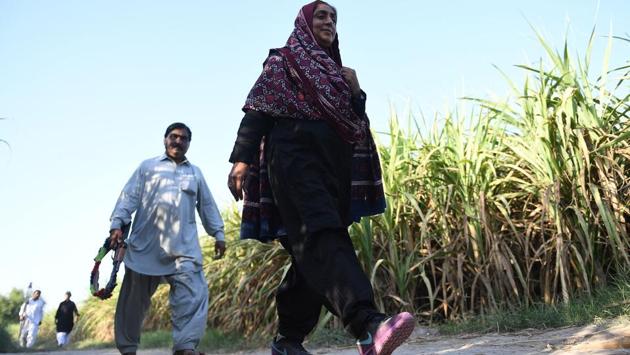 Dharejo walks through her fields in Qazi Ahmed. On the film, ‘My Pure Land’, she said she was “very happy” with the final result, adding that the triumphant story belongs to Sindh and Pakistan. She said, “That is an honour for me.” (Asif Hassan / AFP) Dharejo walks through her fields in Qazi Ahmed. On the film, ‘My Pure Land’, she said she was “very happy” with the final result, adding that the triumphant story belongs to Sindh and Pakistan. She said, “That is an honour for me.” (Asif Hassan / AFP)