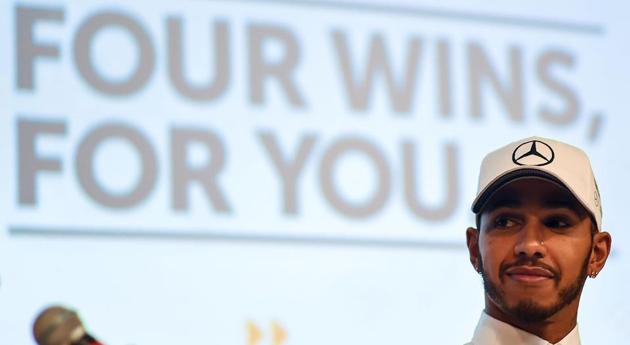 Four-time Formula One world champion, Mercedes F1 team's Lewis Hamilton, during a celebratory event in Kuala Lumpur on Wednesday. (AFP) Four-time Formula One world champion, Mercedes F1 team's Lewis Hamilton, during a celebratory event in Kuala Lumpur on Wednesday. (AFP)
