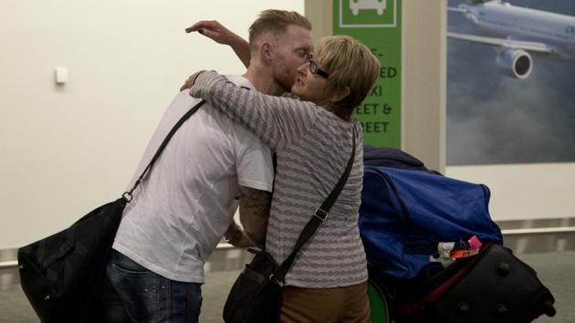 Stokes is embraced by his mother Barbara on his arrival in Christchurch. (AP) 