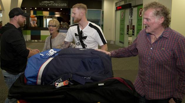 Stokes, center, is welcomed by members of his family on his arrival. British media reported that Stokes is traveling to Christchurch, New Zealand to visit his parents. (AP) 
