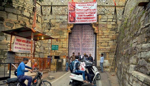 Protestors closed down the historic gate of the Chittorgarh fort, denying tourists entry into the complex on Friday while demanding a ban on the upcoming movie 'Padmavati' (PTI) Protestors closed down the historic gate of the Chittorgarh fort, denying tourists entry into the complex on Friday while demanding a ban on the upcoming movie 'Padmavati' (PTI)