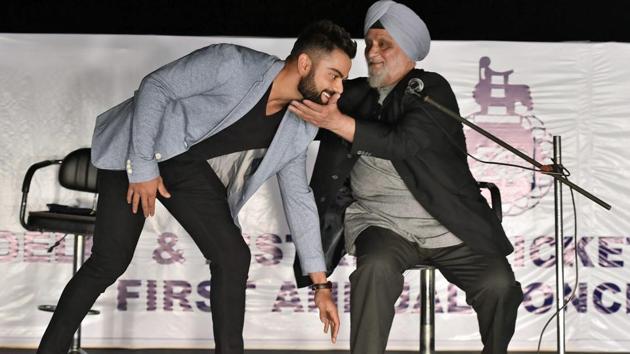 Virat Kohli takes Bishan Singh Bedi’s blessings during Delhi and District Cricket Association’s (DDCA) first Annual Conclave.(PTI)