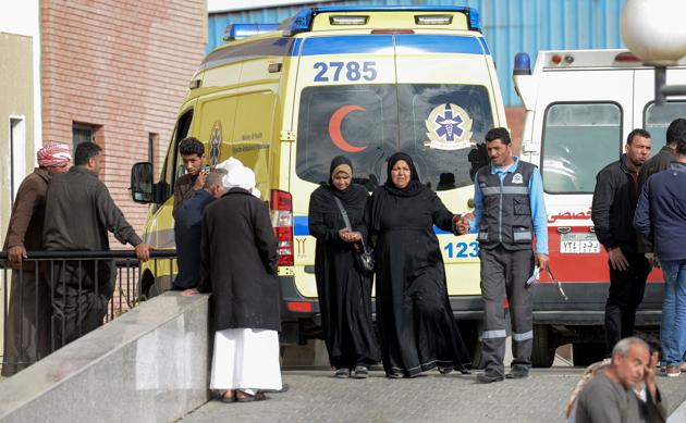 Relatives of the victims of the bomb and gun assault on the North Sinai mosque wait outside the Suez Canal University hospital in the eastern port city of Ismailia on November 25, 2017, where the injured were taken to receive treatment.(AFP)
