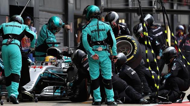 (File picture) Mercedes F1 team pit crew in action -- changing the Pirelli tyres in Lewis Hamilton’s car -- during a pit stop in the Formula One British Grand Prix at at Silverstone earlier this year. (Getty Images) (File picture) Mercedes F1 team pit crew in action -- changing the Pirelli tyres in Lewis Hamilton’s car -- during a pit stop in the Formula One British Grand Prix at at Silverstone earlier this year. (Getty Images)