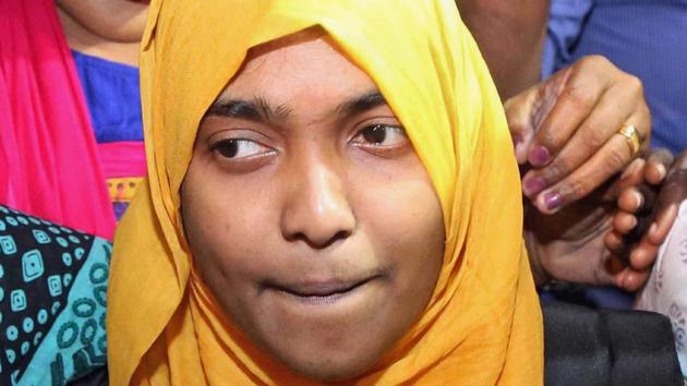 Hadiya, inter-religious marriage, love jihad case, came to Salem Homoeopathy College, after the supreme court order to continue her studies, as her father alleged that she was forcibly converted to Islam, in Salem on Tuesday. (PTI Photo) Hadiya, inter-religious marriage, love jihad case, came to Salem Homoeopathy College, after the supreme court order to continue her studies, as her father alleged that she was forcibly converted to Islam, in Salem on Tuesday. (PTI Photo)