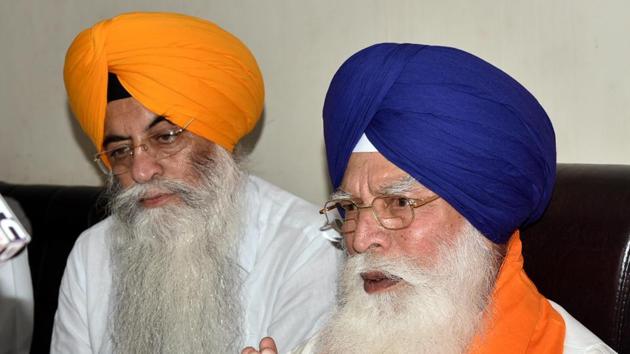 SGPC president Kirpal Singh Badungar (right)earned wrath for the party high command for not accepting to function the way they wanted. (HT File)
