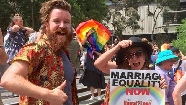 Supporters of the 'Yes' vote react as they celebrate after it was announced the majority of Australians support same-sex marriage in a national survey, paving the way for legislation to make the country the 26th nation to formalise the unions by the end of the year, at a rally in central Melbourne, Australia, November 15, 2017.(Reuters Photo) Supporters of the 'Yes' vote react as they celebrate after it was announced the majority of Australians support same-sex marriage in a national survey, paving the way for legislation to make the country the 26th nation to formalise the unions by the end of the year, at a rally in central Melbourne, Australia, November 15, 2017.(Reuters Photo)