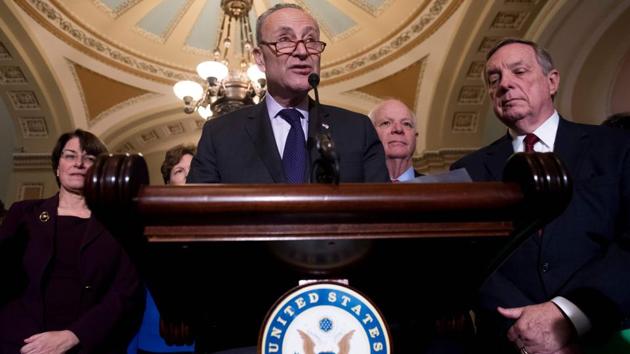 Senate Minority Leader Chuck Schumer, Democrat of New York, alongside US Senate Minority Whip Dick Durbin (R), Democrat of Illinois, speaks to the media about his decision not to attend a meeting with US President Donald Trump, during a press conference at the US Capitol in Washington, DC. (AFP Photo) Senate Minority Leader Chuck Schumer, Democrat of New York, alongside US Senate Minority Whip Dick Durbin (R), Democrat of Illinois, speaks to the media about his decision not to attend a meeting with US President Donald Trump, during a press conference at the US Capitol in Washington, DC. (AFP Photo)