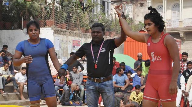 A referee announces Freedom Yadav’s win against her opponent. Yadav was judged the day’s winner in the 75 Kg weight class. (Rajesh Kumar / HT Photo) A referee announces Freedom Yadav’s win against her opponent. Yadav was judged the day’s winner in the 75 Kg weight class. (Rajesh Kumar / HT Photo)