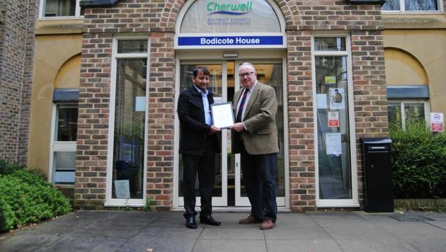 Satbir Arora was presented with a certificate for outstanding achievement . (Twitter:Cherwell Council) Satbir Arora was presented with a certificate for outstanding achievement . (Twitter:Cherwell Council)