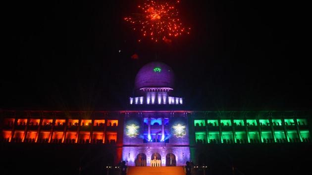 Sudan Block lit in tricolours during the Light and Sound Show of 133rd NDA course at The National Defence Academy (NDA) in Pune on Wednesday. (Pratham Gokhale/HT Photo) 