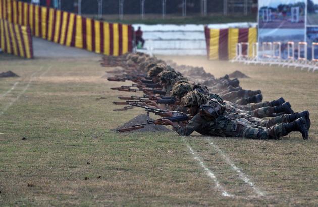 Cadets enact a combat scene as they prepare for the bayonet charge (dhava) during the PT & Equestrian Display of the 133rd NDA course at The National Defence Academy (NDA) in Pune on Wednesday. (Pratham Gokhale/HT Photo) 