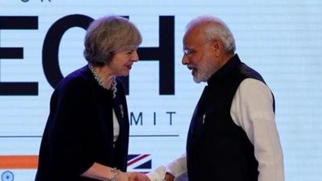 Britain's Prime Minister Theresa May shakes hands with Prime Minister Narendra Modi during the India-UK Tech Summit in New Delhi, November 7, 2016. REUTERS/Adnan Abidi/Files Britain's Prime Minister Theresa May shakes hands with Prime Minister Narendra Modi during the India-UK Tech Summit in New Delhi, November 7, 2016. REUTERS/Adnan Abidi/Files