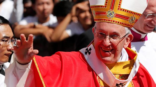 Pope Francis leaves after celebrating a Mass at St Mary's Cathedral in Yangon, Myanmar November 30, 2017.(REUTERS) Pope Francis leaves after celebrating a Mass at St Mary's Cathedral in Yangon, Myanmar November 30, 2017.(REUTERS)