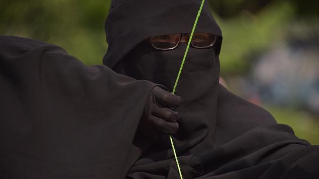 One of the niqab-wearing novices fired off arrows with suction-cup tips. A fellow member added that, “Even running is okay. If you’re used to it, it’s comfortable. The most important thing is that you don’t see it (niqab) as a burden and you’ve got to be patient.” (Adek Berry / AFP) One of the niqab-wearing novices fired off arrows with suction-cup tips. A fellow member added that, “Even running is okay. If you’re used to it, it’s comfortable. The most important thing is that you don’t see it (niqab) as a burden and you’ve got to be patient.” (Adek Berry / AFP)