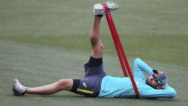 Australia cricket team's Nathan Lyon stretches during a training session in Adelaide on Thursday, ahead of the second Ashes 2017-18 cricket Test against England cricket team which begins on Saturday. (AP) Australia cricket team's Nathan Lyon stretches during a training session in Adelaide on Thursday, ahead of the second Ashes 2017-18 cricket Test against England cricket team which begins on Saturday. (AP)